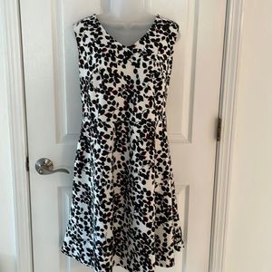 Talbots Slimming Sleeveless Dress White with Black Leaves and Red Highlights.